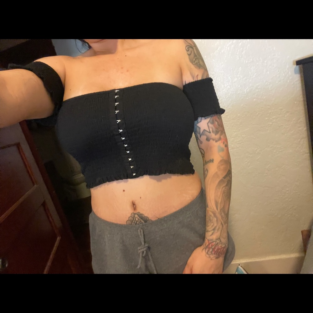 Black tube with attached sleeves